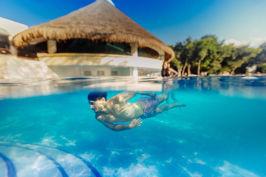 Occidental At Xcaret Destination Hotel Playa del Carmen Bagian luar foto Swimming in a pool